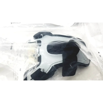 Black and white orthopedic knee brace with adjustable straps philips m af531 af531 ee leak reuse medical use