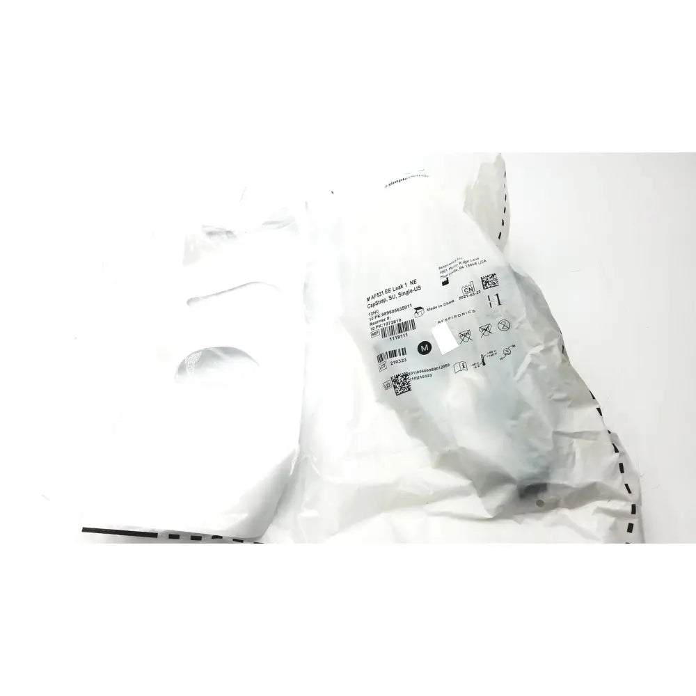 White plastic packaging with printed labels and barcode of philips m af531 ee leak cap strap for reuse medical use