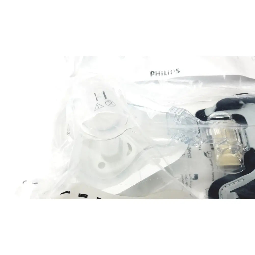 Philips M AF531 clear plastic face mask with black and white components for reuse medical use and AF531 EE leak control
