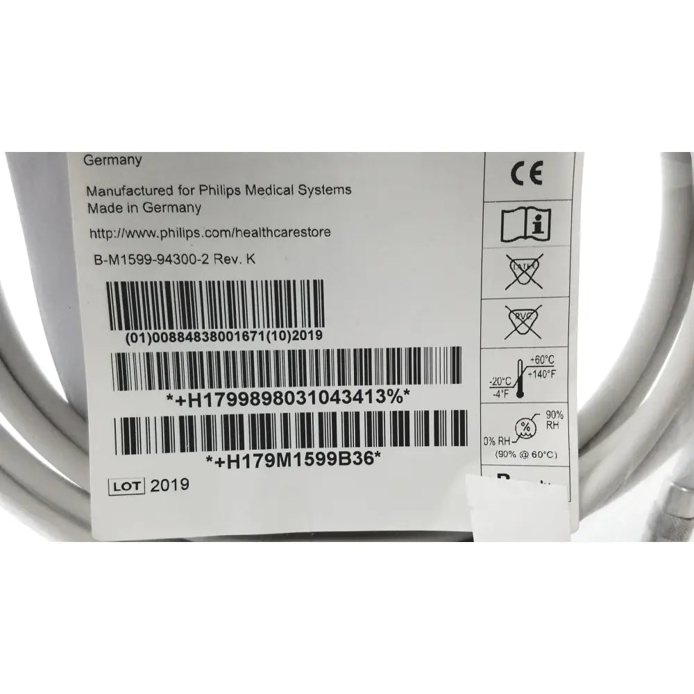 White label with black text and barcodes on the back side of philips m1599b adult nibp air hose 3.0m medical device from germany