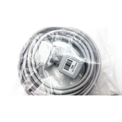 Gray coiled cable with white plug and gray connector in clear plastic packaging for philips m2501a mainstream etco2