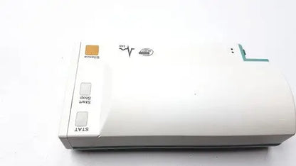 White plastic sony playstation 1 console with orange power button and gray start stop buttons in philips m3001a a03 module