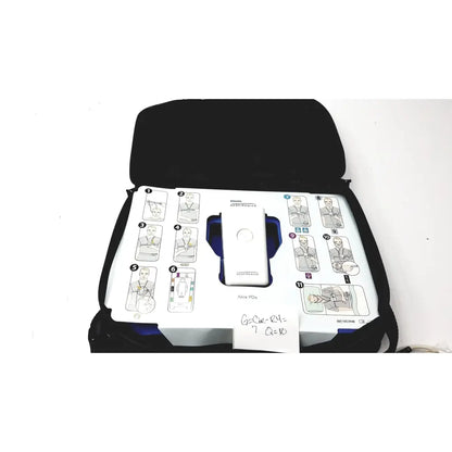 White philips respiironics alice pdx portable oxygen concentrator in black carrying case with instructional diagrams