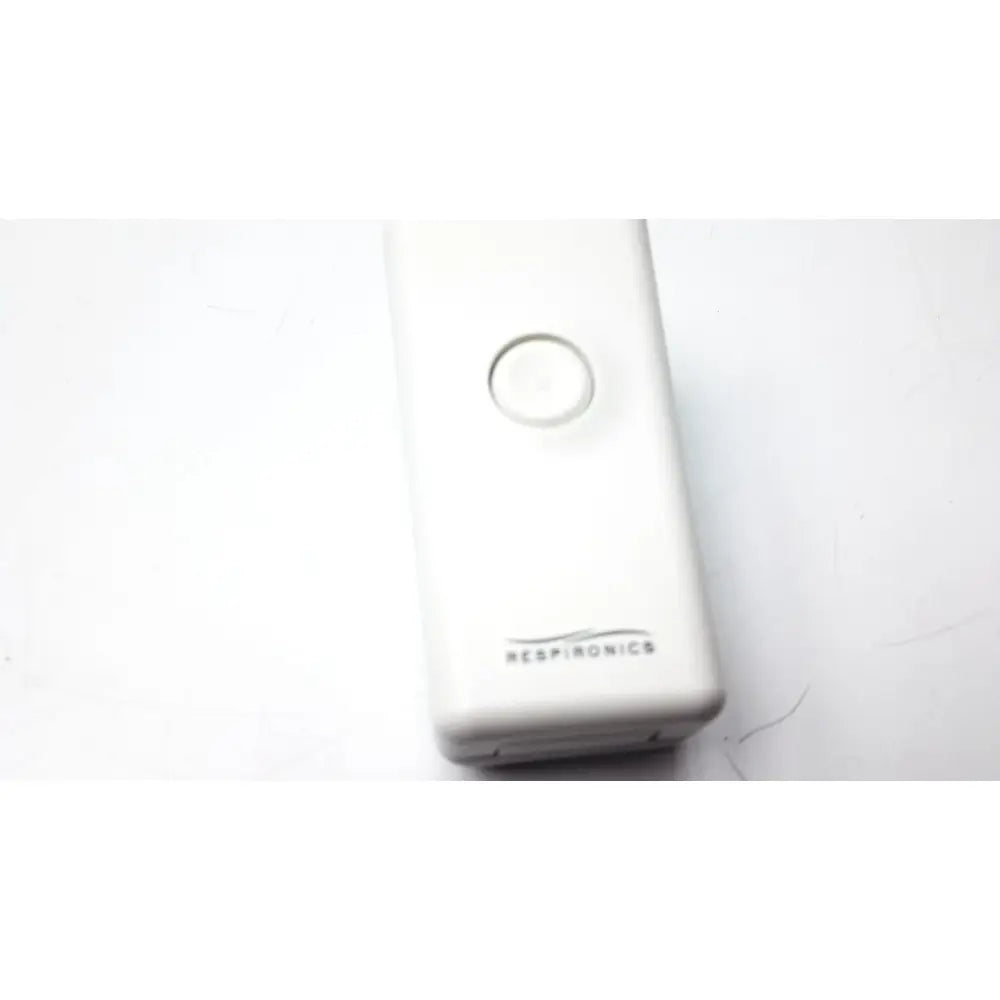 White rectangular philips respiironics alice pdx portable sleep diagnostic device with circular button and subtle branding