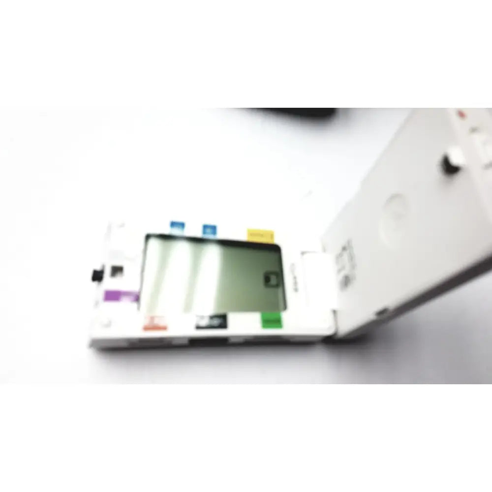 White handheld philips respiironics alice pdx portable sleep diagnostic system with colorful buttons and small screen