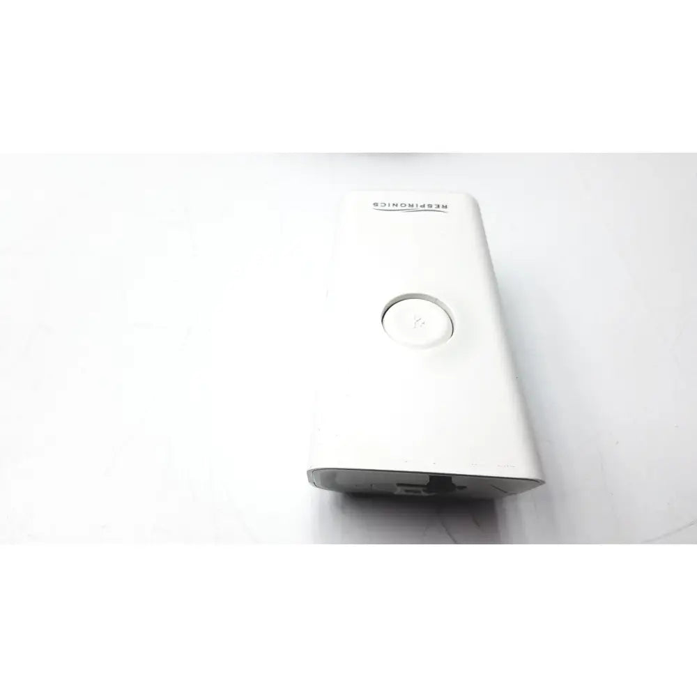 White philips respiironics alice pdx portable sleep diagnostic system with circular power button and sleek design