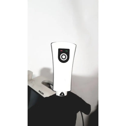 White philips suresigns vs4 patient monitor with black control panel and circular logo for clinical use