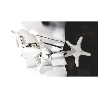 White industrial sewing machine with star-shaped base and coiled cable featured alongside philips suresigns vs4 patient monitor