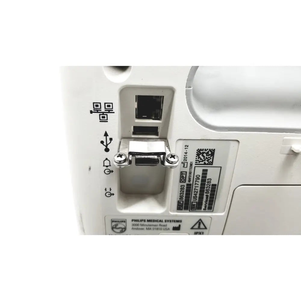 Back of white philips suresigns vs4 vital medical device with silver metal port cover and black ethernet ports