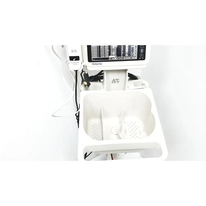 White Philips SureSigns VS4 medical cart with digital display and multiple storage compartments for vital signs monitoring