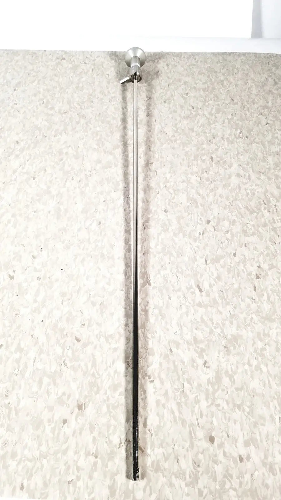 A sleek chrome flagpole with polished spherical finial shown alongside the pilling 50-4010 90 degree arthroscope reuse medical tool