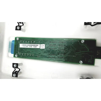 Green rectangular circuit board with silver screws and blue connector of planmeca intra x-ray control pad back side