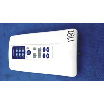 White rectangular Planmeca Intra control pad with blue panel and digital displays for Planmeca Intra x-ray settings