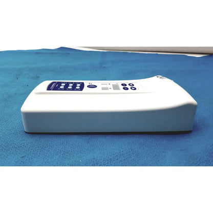 White rectangular planmeca intra x-ray control pad with blue button panel and small display screen for dental imaging