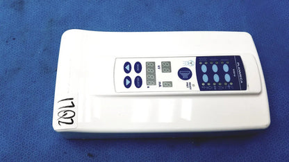 White rectangular planmeca intra x-ray control pad with blue digital display and buttons branded planica