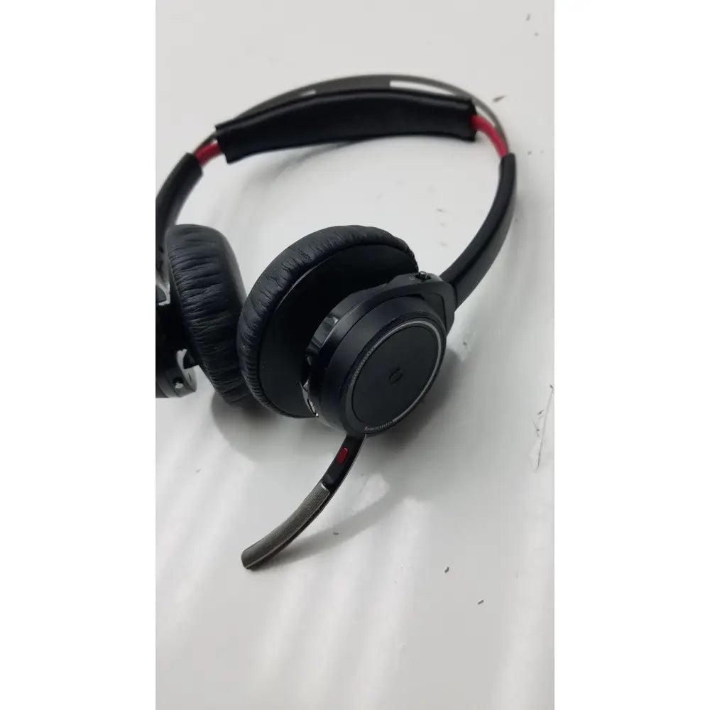 Black over-ear plantronics voyager focus b825 bluetooth headphones with red trim and flexible microphone boom