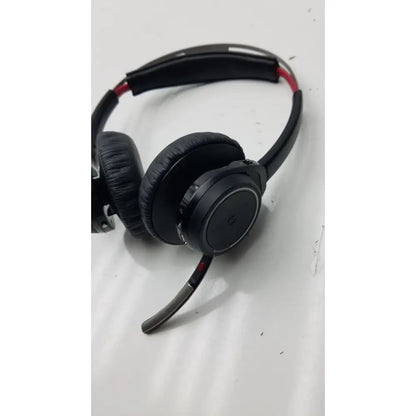 Black over-ear plantronics voyager focus b825 bluetooth headphones with red trim and flexible microphone boom