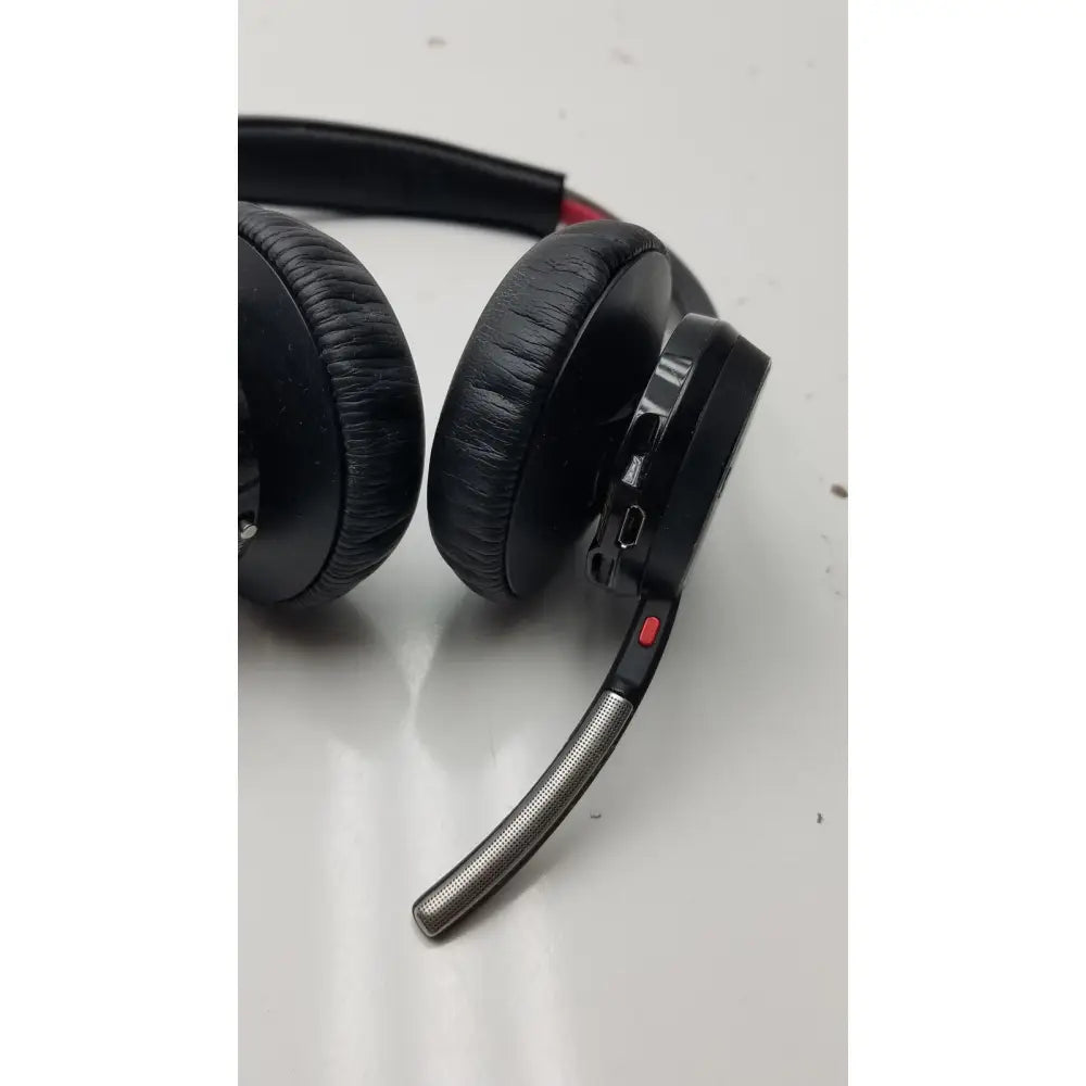 Plantronics Voyager Focus B825 black over-ear wireless headphones with silver microphone arm and red accent button