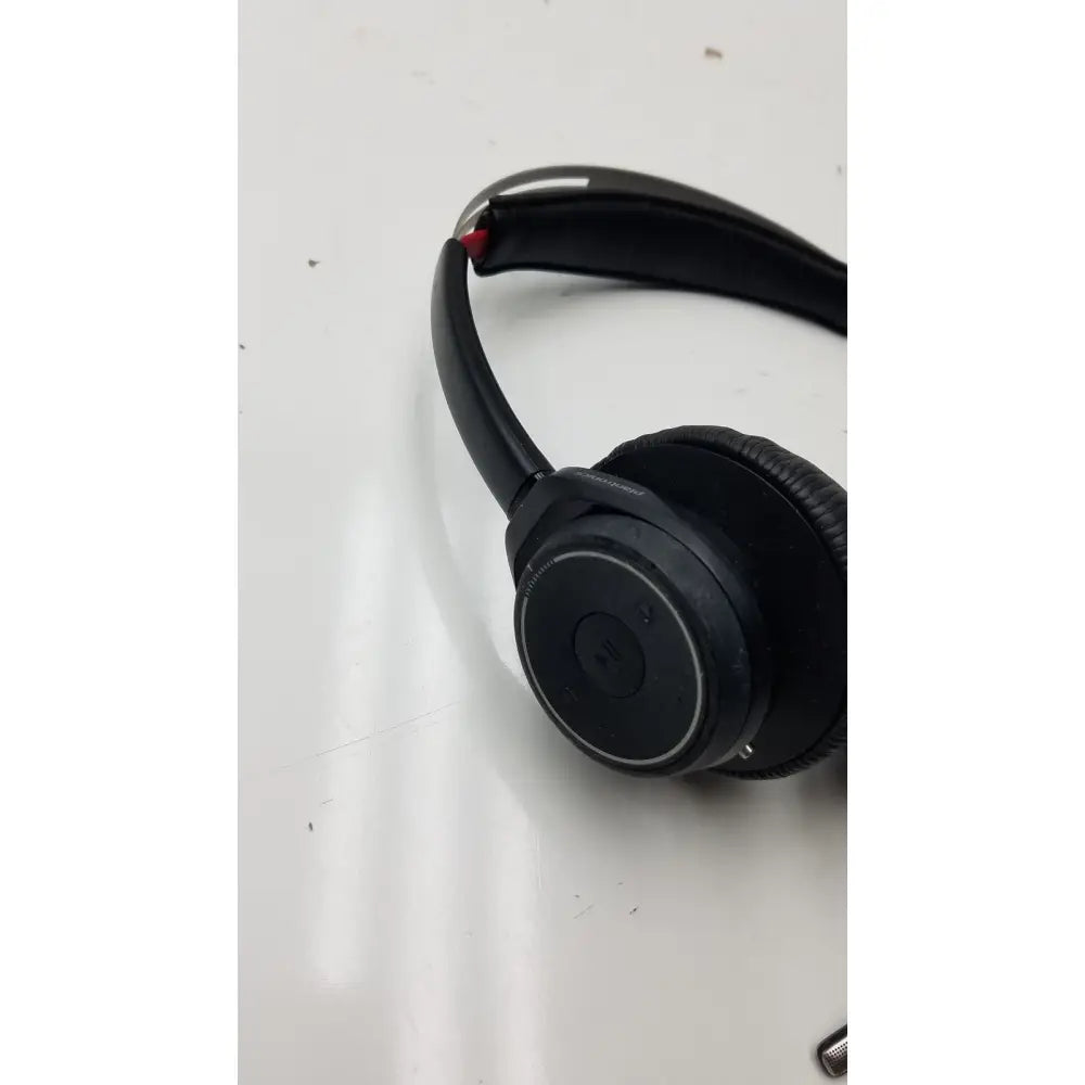 Black over-ear wireless headphones with matte finish and padded earcups plantronics voyager focus b825 bluetooth anc