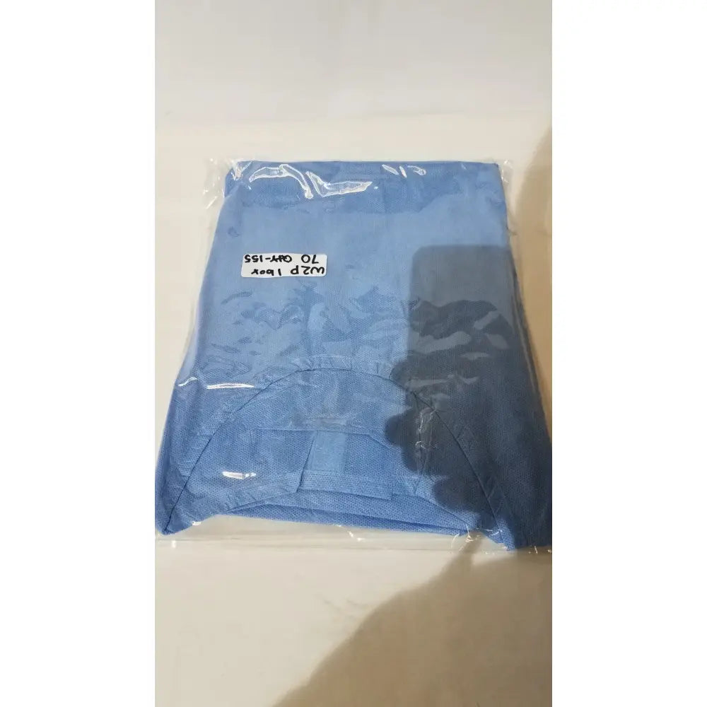 Blue folded pod disposable isolation gown in clear plastic packaging single use medical disposable isolation gown blue