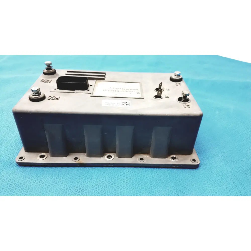 Gray metallic rectangular polaris control module ecu with black connectors and mounting brackets for engine control unit
