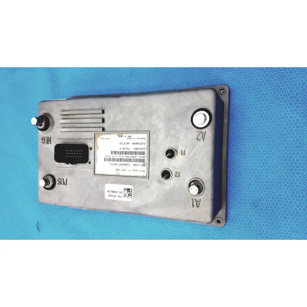 Gray metallic polaris control module ecu ecm with labeled ports and barcode sticker on the back side of the device