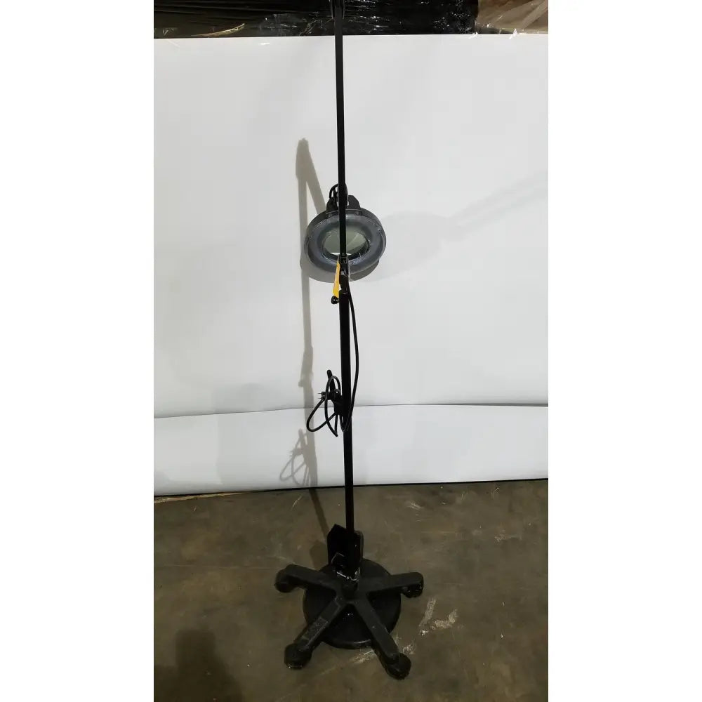 Black adjustable floor light lamp with circular head and four-legged base portable magnifying light lamp ac110v 60hz