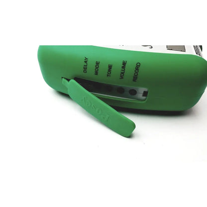 Green silicone-covered posey sitter elite patient fall monitor alarm with labeled control buttons for volume and record functions
