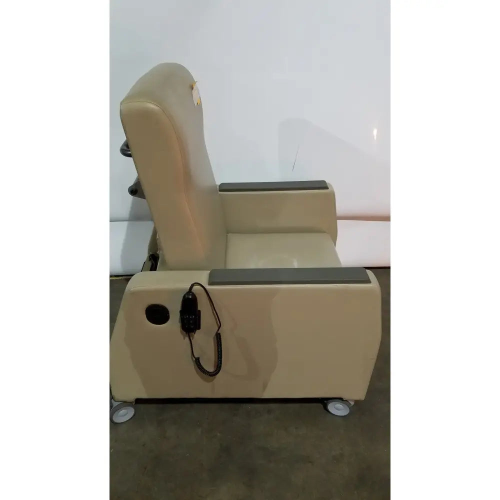 Beige upholstered power recovery recliner with gray armrests and built-in hand control panel for ease of use