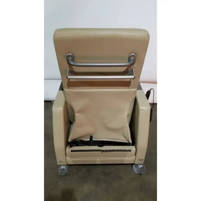 Beige upholstered power recovery recliner with metal armrest bars and caster wheels featuring hand control