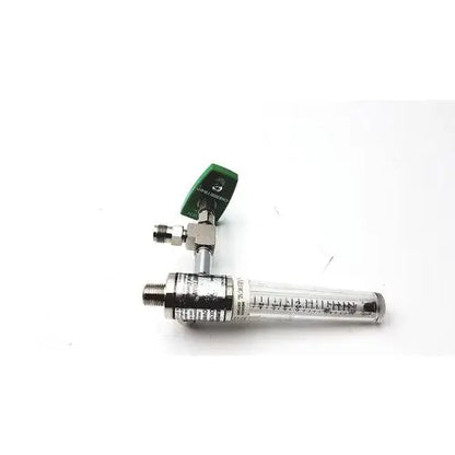 Green and silver precision medical regulator gauge with clear glass flow meter and measurement markings for oxygen control