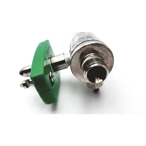 Green plastic precision medical regulator gauge connector with metallic threaded end and two silver pins