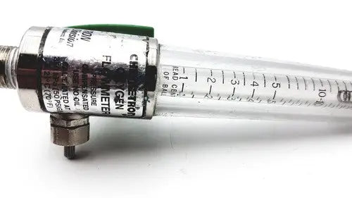 Clear glass precision medical regulator gauge with black and silver metallic components marked ceron gen