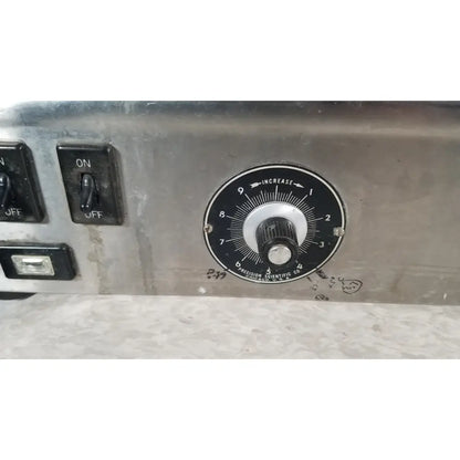 Black rotary dial with white markings on metallic surface of precision scientific metabolic shaking incubator 66722