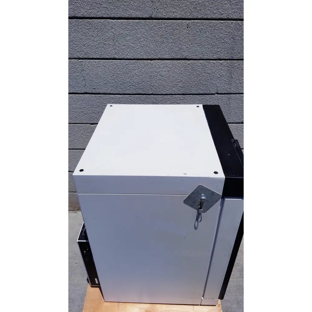 White and black metal storage cabinet with diamond-shaped lock plate for precision scientific napco water jacketed co2 incubator