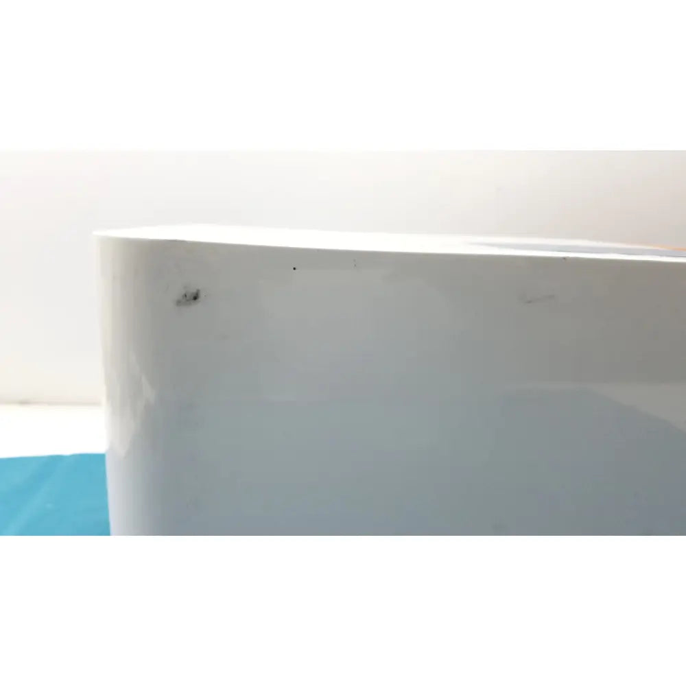 White plastic container with a curved edge and minor surface imperfections for proteinsimple wes analyzer reuse medical use