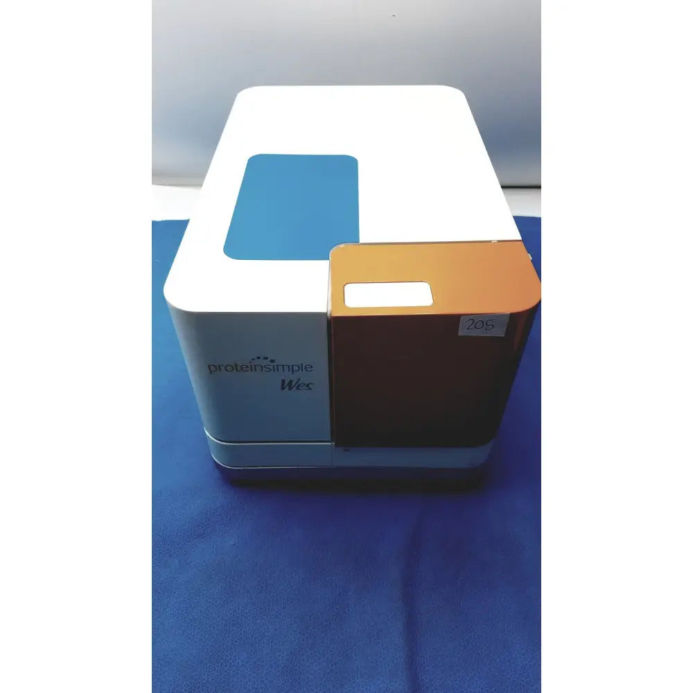 Proteinsimple Wes analyzer system in white and orange with a blue window for reuse medical protein analysis