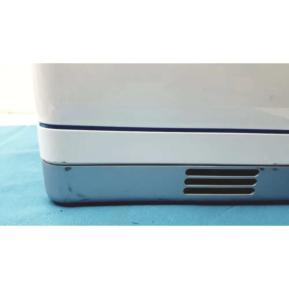 White and silver proteinsimple wes analyzer system with a blue accent stripe for advanced protein analysis