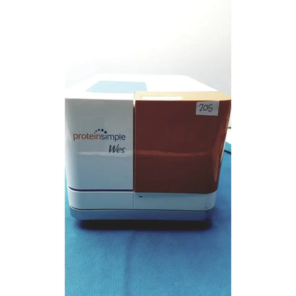 White and brown proteinsimple wes analyzer system with matte white and glossy brown finishes for protein analysis
