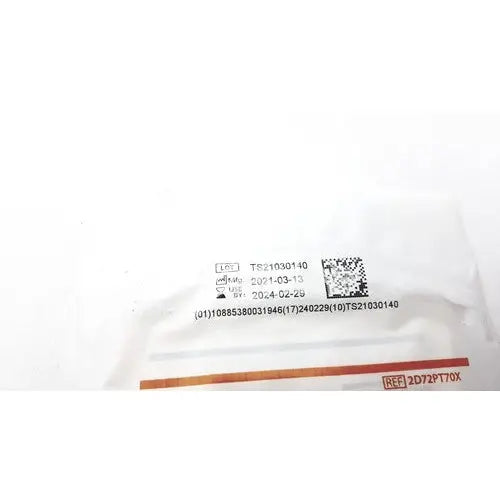 White plastic packaging of protexis pi surgical glove 2d72pt70x size 7 with barcode serial numbers and date codes visible