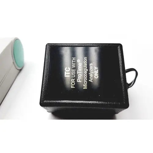Black rectangular itc protime ivd microcoagulation analyzer adapter with teal cylindrical component for ivd microcoagulation system
