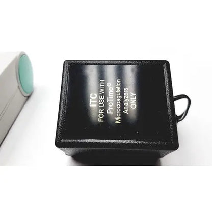 Black rectangular itc protime ivd microcoagulation analyzer adapter with teal cylindrical component for ivd microcoagulation system