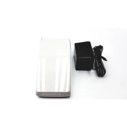 White rectangular wireless charging pad with gray trim for protime ivd microcoagulation system device