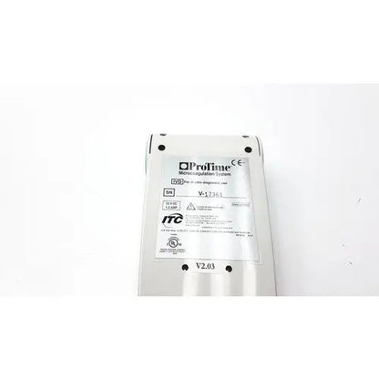 Silver metallic protime ivd microcoagulation system showing protime ivd diagnostic tool with model and certification label