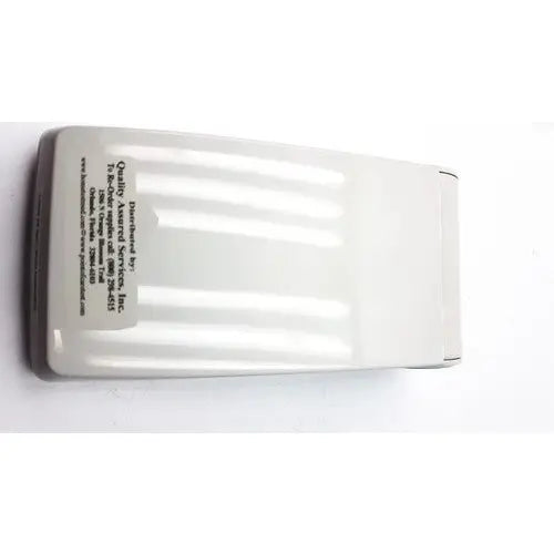 White plastic rectangular remote control with horizontal ridges on back for protime microcoagulation system l11-01-01 reuse medical