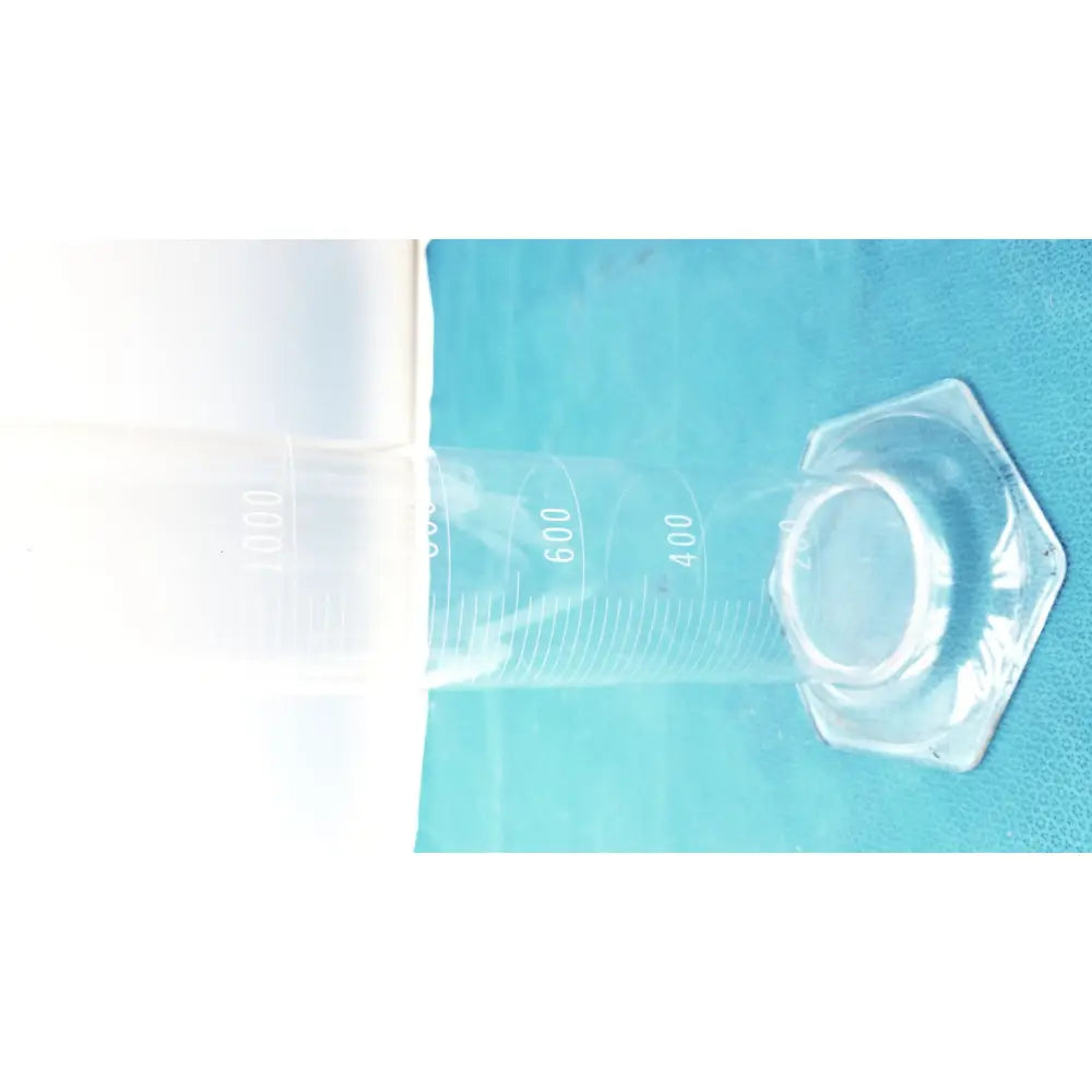 Clear pyrex 2000ml graduated cylinder made of borosilicate glass with hexagonal base and milliliter markings