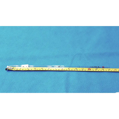 Clear pyrex 4ml class a glass graduated cylinder with black markings and white cap on yellow measuring tape
