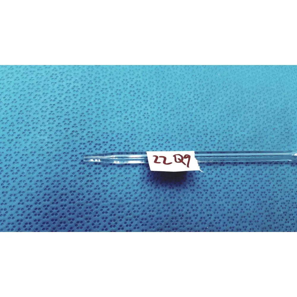 Clear pyrex class 1ml glass volumetric pipette with narrow tip and white label marked 22q9 for precise lab use