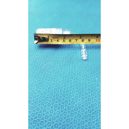 Clear glass pyrex glass adapter with white cap and small transparent plastic component for right-angle tubing connection