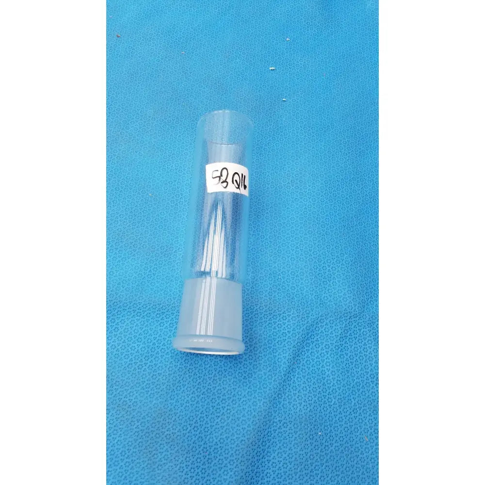 Clear plastic tube with pyrex ground glass 45/50 outer joint containing thin transparent borosilicate needles